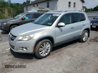 2011 Volkswagen Tiguan SEL z VIN WVGBV7AX4BW534922, wystawiony jako Copart lot #60486775 z przebiegiem Nie podano mil oraz Czysty tytuł • Clean title. Historia ofert i sprzedaży dostępna na DreamBid. Obrazek 1.