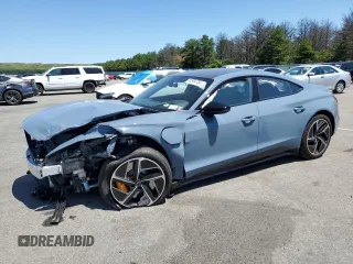 2023 Audi RS e-tron GT z VIN WAUBHBFW1P7902115, wystawiony jako Copart lot #60994784 z przebiegiem 10 305 mil mil oraz Szkody całkowita. Historia ofert i sprzedaży dostępna na DreamBid. Obrazek 1.