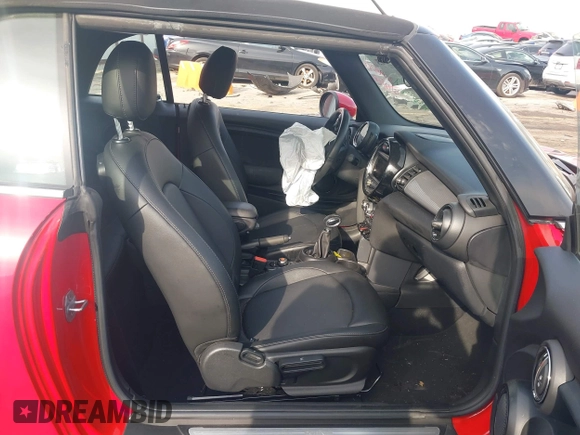 2019 MINI Convertible Cooper with VIN WMWWG5C59K3F79792, listed as a IAAI auction lot 41779813 with 25,671 mi miles and . Bid and sale history available at DreamBid. Image 5.