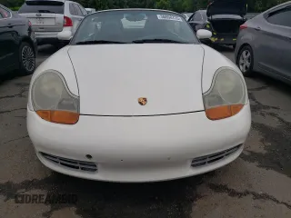 2001 Porsche Boxster z VIN WP0CA29821U622592, wystawiony jako Copart lot #56050735 z przebiegiem Nie podano mil oraz Szkoda całkowita • Salvage title. Historia ofert i sprzedaży dostępna na DreamBid. Obrazek 5.