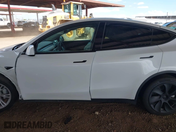 2021 Tesla Model Y Long Range with VIN 5YJYGAEE9MF254113, listed as a IAAI auction lot 42045256 with Not Provided miles. Bid and sale history available at carsss.com. Image 13.
