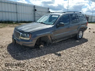 2004 Jeep Grand Cherokee Limited with VIN 1J4GW58N74C144444, listed as a Copart auction lot 57696365 with 207,883 mi miles and Clean title. Bid and sale history available at DreamBid. Image 1.