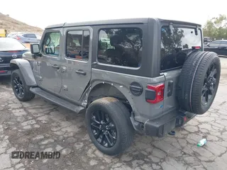 2021 Jeep Wrangler Unlimited Sahara with VIN 1C4JJXP64MW720263, listed as a IAAI auction lot 41514302 with 73,300 mi miles and . Bid and sale history available at DreamBid. Image 3.