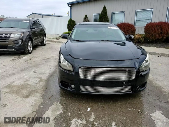 2014 Nissan Maxima SV с VIN 1N4AA5AP1EC441089, выставлен на аукционе Copart как лот 52320335 с пробегом 182 909 миль миль и Списание • Salvage title. История ставок и продаж доступна на DreamBid. Изображение 13.
