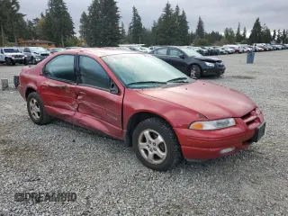 2000 Dodge Stratus z VIN 1B3EJ56HXYN234000, wystawiony jako Copart lot #75548584 z przebiegiem 177 191 mil mil oraz Szkody całkowita. Historia ofert i sprzedaży dostępna na DreamBid. Obrazek 4.