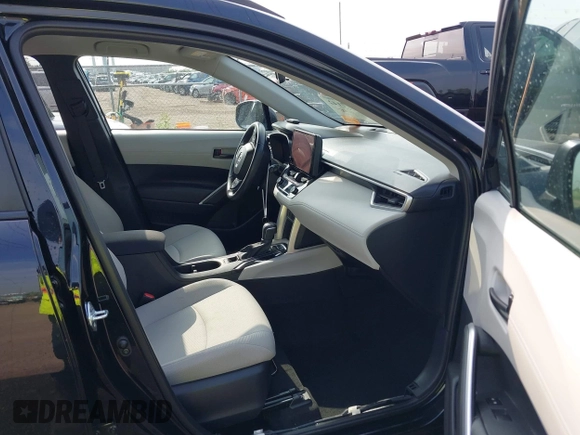 2023 Toyota Corolla Cross LE with VIN 7MUCAAAG3PV067507, listed as a IAAI auction lot 42177142 with 124,772 mi miles and . Bid and sale history available at DreamBid. Image 5.
