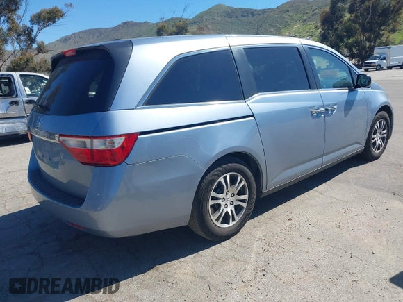 2012 Honda Odyssey EX-L with VIN 5FNRL5H69CB003067, listed as a IAAI auction lot 41862591 with 163,158 mi miles and . Bid and sale history available at carsss.com. Image 4.