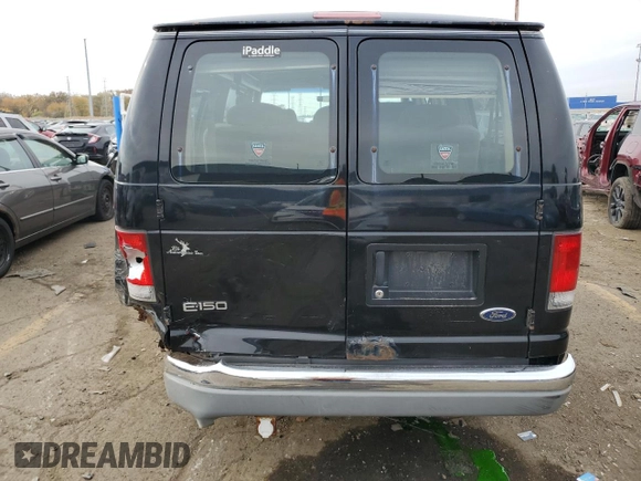 1999 Ford Econoline Cargo with VIN 1FDRE14W6XHA56562, listed as a Copart auction lot 75185804 with 153,673 mi miles and Clean Title. Bid and sale history available at carsss.com. Image 6.
