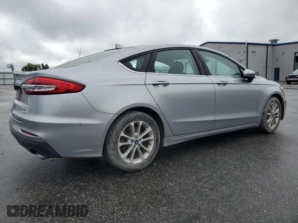 2020 Ford Fusion SE z VIN 3FA6P0HD0LR256243, wystawiony jako Copart lot #56513215 z przebiegiem 59 996 mil mil oraz Szkoda całkowita • Salvage title. Historia ofert i sprzedaży dostępna na DreamBid. Obrazek 3.