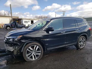 2017 Honda Pilot Touring with VIN 5FNYF6H90HB028112, listed as a Copart auction lot 52197645 with 218,944 mi miles and Salvage Title. Bid and sale history available at carsss.com. Image 1.
