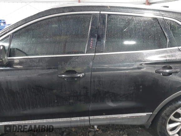 2015 Lincoln MKC with VIN 5LMCJ2A98FUJ17855, listed as a IAAI auction lot 41433416 with 113,070 mi miles. Bid and sale history available at carsss.com. Image 14.