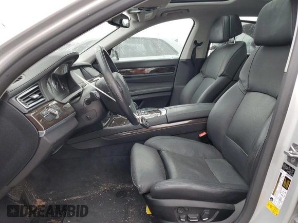 2012 BMW 7 Series 740Li with VIN WBAKB4C5XCC575479, listed as a Copart auction lot 86714504 with 58,585 mi miles and Salvage Title. Bid and sale history available at carsss.com. Image 7.