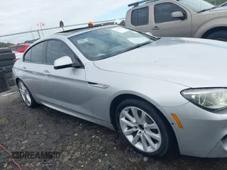 2014 BMW 6 Series 650i z VIN WBA6B2C58ED129639, wystawiony jako IAAI lot #42171786 z przebiegiem 108 677 mil mil oraz . Historia ofert i sprzedaży dostępna na DreamBid. Obrazek 13.