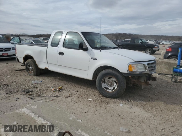 2002 Ford F-150 XL with VIN 1FTRX17212NA65610, listed as a Copart auction lot 50460585 with 129,823 mi miles and Clean Title. Bid and sale history available at carsss.com. Image 4.