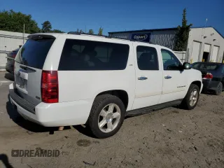 2008 Chevrolet Suburban LT w/2LT with VIN 3GNFC16038G200111, listed as a Copart auction lot 54921175 with 490,511 mi miles and Clean Title. Bid and sale history available at carsss.com. Image 3.