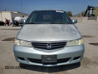 2004 Honda Odyssey EX z VIN 5FNRL18604B080100, wystawiony jako Copart lot #53924755 z przebiegiem 240 913 mil mil oraz Szkoda całkowita • Salvage title. Historia ofert i sprzedaży dostępna na DreamBid. Obrazek 5.