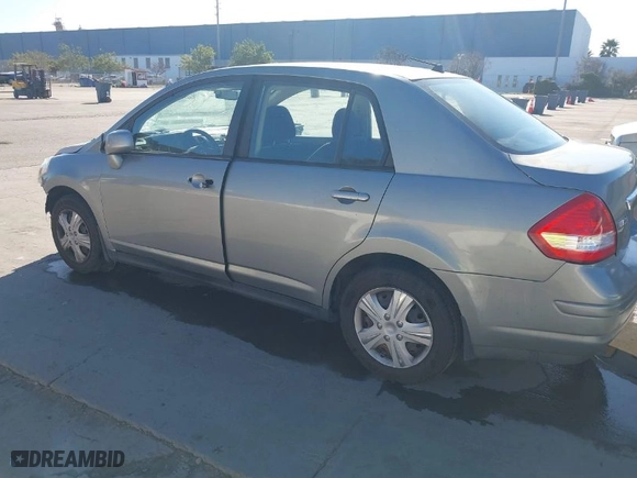 2010 Nissan Versa 1.8 S with VIN 3N1BC1AP2AL450998, listed as a IAAI auction lot 41433147 with 88,535 mi miles. Bid and sale history available at carsss.com. Image 3.