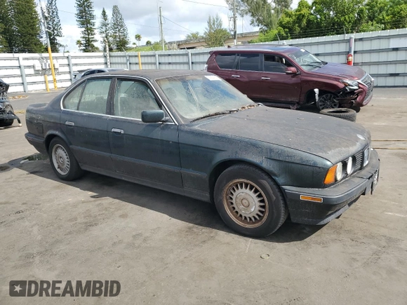 1994 BMW 5 Series 525i z VIN WBAHD632XRGK40231, wystawiony jako Copart lot #59364145 z przebiegiem Nie podano mil oraz Czysty tytuł • Clean title. Historia ofert i sprzedaży dostępna na DreamBid. Obrazek 4.