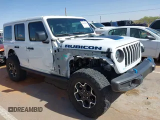 2023 Jeep Wrangler Rubicon with VIN 1C4JJXR63PW580370, listed as a IAAI auction lot 42017282 with 31,823 mi miles and . Bid and sale history available at DreamBid. Image 14.