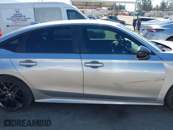 2023 Honda Civic Sport with VIN 2HGFE2F56PH500505, listed as a IAAI auction lot 42239112 with 39,513 mi miles and . Bid and sale history available at DreamBid. Image 13.