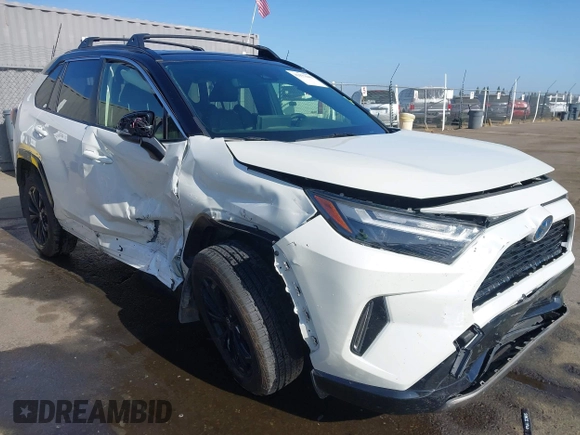 2022 Toyota RAV4 Hybrid XSE with VIN JTME6RFV9ND534822, listed as a IAAI auction lot 42477646 with 49,991 mi miles and . Bid and sale history available at DreamBid. Image 6.