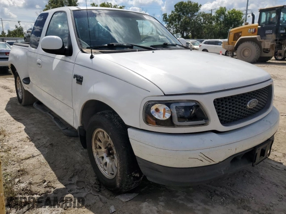 2001 Ford F-150 XL with VIN 1FTRX07L81KF40897, listed as a Copart auction lot 73887094 with 0 mi miles and Salvage Title. Bid and sale history available at carsss.com. Image 4.