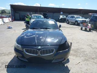 2011 BMW Z4 sDrive35i with VIN WBALM7C58BE383710, listed as a IAAI auction lot 41953452 with 102,510 mi miles. Bid and sale history available at carsss.com. Image 12.