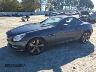 2012 Mercedes-Benz SLK-Class SLK 350 with VIN WDDPK5HA6CF030999, listed as a Copart auction lot 80748424 with 100,496 mi miles and Salvage Title. Bid and sale history available at carsss.com. Image 1.