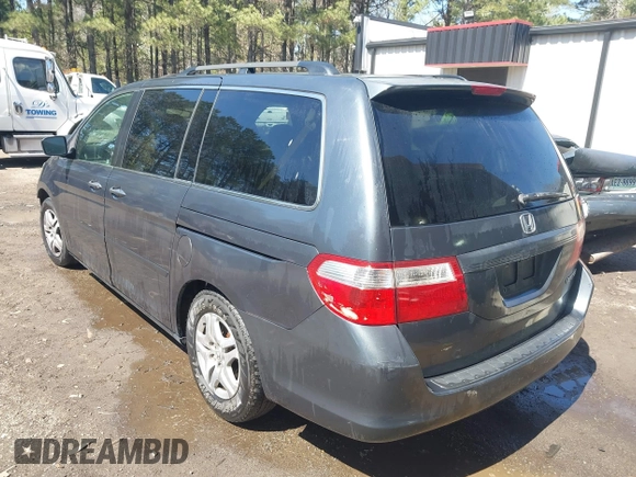 2005 Honda Odyssey EX-L with VIN 5FNRL387X5B069823, listed as a IAAI auction lot 41883007 with 267,250 mi miles and . Bid and sale history available at DreamBid. Image 3.