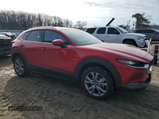 2024 Mazda CX-30 S Premium with VIN 3MVDMBDM7RM601218, listed as a Copart auction lot 45670915 with 22,265 mi miles and Salvage title. Bid and sale history available at DreamBid. Image 4.