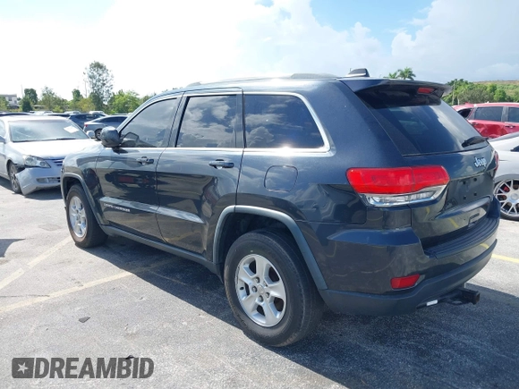2014 Jeep Grand Cherokee Laredo with VIN 1C4RJEAG0EC179563, listed as a IAAI auction lot 39799427 with 209,169 mi miles and . Bid and sale history available at DreamBid. Image 3.
