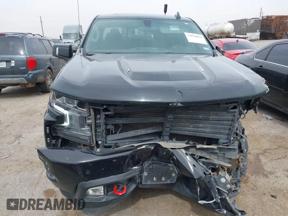 2021 Chevrolet Silverado 1500 LT Trail Boss with VIN 3GCPYFEL0MG173340, listed as a IAAI auction lot 38840038 with 57,253 mi miles and . Bid and sale history available at DreamBid. Image 12.