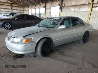 2001 Toyota Camry CE z VIN 4T1BG22K11U017054, wystawiony jako Copart lot #57623485 z przebiegiem 242 217 mil mil oraz Szkoda całkowita • Salvage title. Historia ofert i sprzedaży dostępna na DreamBid. Obrazek 1.
