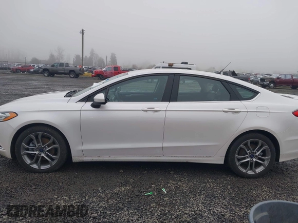 2017 Ford Fusion SE z VIN 3FA6P0H71HR201799, wystawiony jako IAAI lot #41346018 z przebiegiem 51 126 mil mil oraz . Historia ofert i sprzedaży dostępna na DreamBid. Obrazek 14.