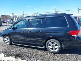 2008 Honda Odyssey Touring with VIN 5FNRL38948B029193, listed as a IAAI auction lot 41618424 with 219,964 mi miles. Bid and sale history available at carsss.com. Image 15.
