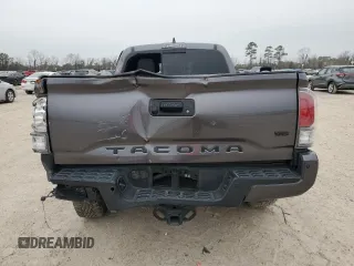 2021 Toyota Tacoma 4WD SR5 with VIN 5TFDZ5BN8MX062787, listed as a Copart auction lot 44987135 with 59,351 mi miles and Salvage Title. Bid and sale history available at carsss.com. Image 6.
