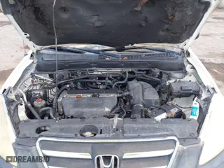 2005 Honda CR-V LX with VIN JHLRD68565C005484, listed as a IAAI auction lot 41983513 with 215,839 mi miles. Bid and sale history available at carsss.com. Image 10.
