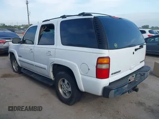 2003 Chevrolet Tahoe LT z VIN 1GNEC13Z53R314957, wystawiony jako IAAI lot #42035283 z przebiegiem 358 174 mil mil oraz . Historia ofert i sprzedaży dostępna na DreamBid. Obrazek 3.