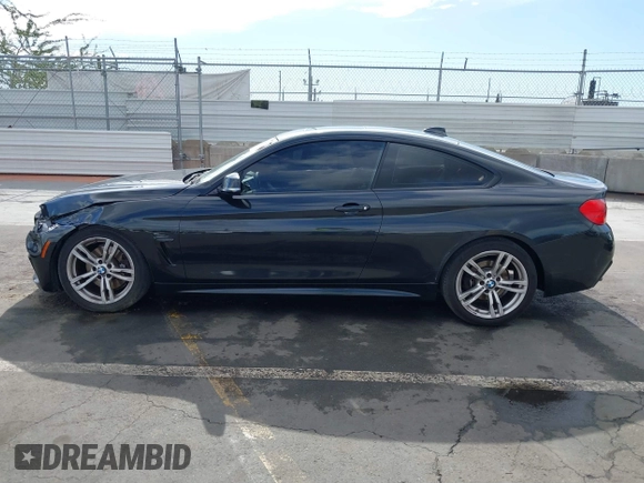 2014 BMW 4 Series 428i with VIN WBA3N7C55EF719504, listed as a IAAI auction lot 41403957 with 98,882 mi miles and . Bid and sale history available at carsss.com. Image 14.