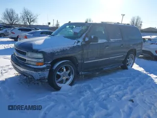 2004 Chevrolet Suburban LS with VIN 3GNEC16Z94G319009, listed as a IAAI auction lot 41531390 with 259,957 mi miles. Bid and sale history available at carsss.com. Image 2.