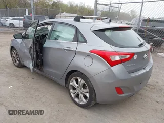2014 Hyundai Elantra GT with VIN KMHD35LH6EU165019, listed as a IAAI auction lot 42016057 with 121,794 mi miles. Bid and sale history available at carsss.com. Image 3.