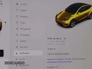 2020 Tesla Model Y Long Range z VIN 5YJYGDEE8LF008945, wystawiony jako IAAI lot #41185905 z przebiegiem 31 916 mil mil oraz . Historia ofert i sprzedaży dostępna na DreamBid. Obrazek 15.