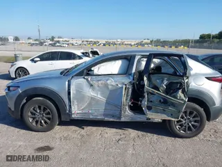 2020 Mazda CX-30 with VIN 3MVDMABL9LM102688, listed as a IAAI auction lot 41680270 with NaN miles. Bid and sale history available at carsss.com. Image 6.