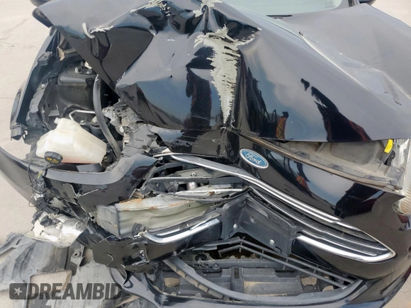 2018 Ford Fiesta SE z VIN 3FADP4BJ8JM134544, wystawiony jako Copart lot #58231305 z przebiegiem Nie podano mil oraz Tytuł czysty. Historia ofert i sprzedaży dostępna na DreamBid. Obrazek 11.