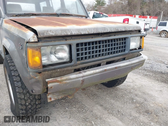 1990 Isuzu Trooper z VIN JACCH58R0L8900522, wystawiony jako IAAI lot #41642808 z przebiegiem 177 690 mil mil oraz . Historia ofert i sprzedaży dostępna na DreamBid. Obrazek 6.