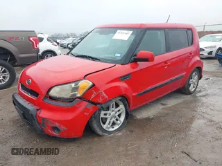 2011 Kia Soul + with VIN KNDJT2A25B7218551, listed as a IAAI auction lot 41521447 with 195,282 mi miles. Bid and sale history available at carsss.com. Image 2.