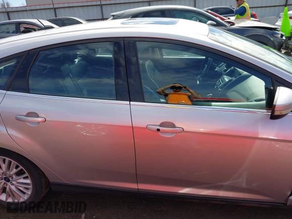 2017 Ford Focus Titanium with VIN 1FADP3N26HL309903, listed as a IAAI auction lot 41642306 with 107,762 mi miles and . Bid and sale history available at carsss.com. Image 13.