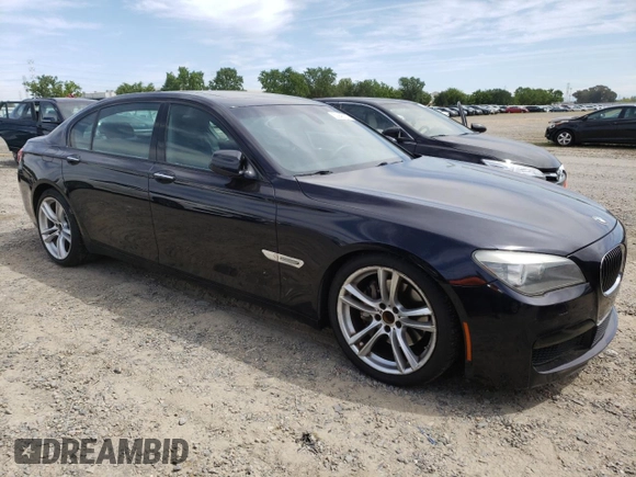 2012 BMW 7 Series 740Li with VIN WBAKB4C5XCC576227, listed as a Copart auction lot 52946135 with 154,611 mi miles and Salvage Title. Bid and sale history available at carsss.com. Image 4.