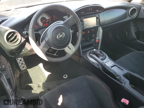2014 Scion FR-S z VIN JF1ZNAA1XE8707871, wystawiony jako Copart lot #57945695 z przebiegiem 140 517 mil mil oraz Czysty tytuł • Clean title. Historia ofert i sprzedaży dostępna na DreamBid. Obrazek 8.