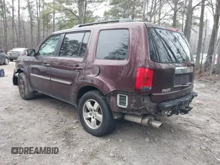 2010 Honda Pilot Touring with VIN 5FNYF4H9XAB040715, listed as a IAAI auction lot 41807334 with 262,786 mi miles and . Bid and sale history available at carsss.com. Image 3.